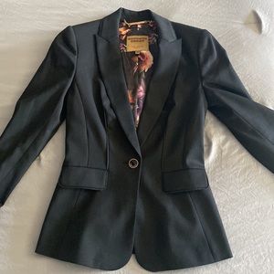 Form fitting blazer from Ted Baker. New. Never worn